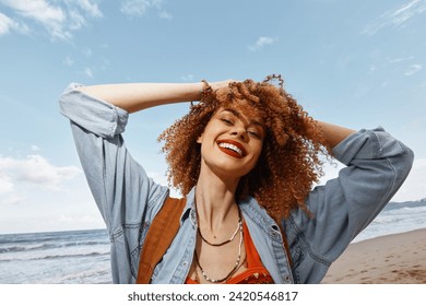 Smiling Woman with Backpack, Enjoying Happy Vacation at Beach - Powered by Shutterstock