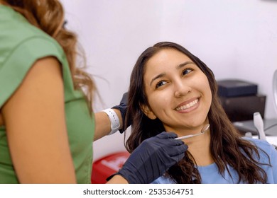 Smiling Woman at Dental Checkup with Dentist - Powered by Shutterstock