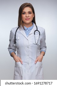 Smiling Woman Doctor Holding Hands In Pocket. Isolated Female Portrait.