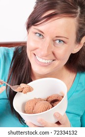 Smiling Woman Eating Ice Cream