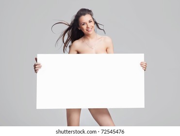 Smiling woman with empty board
