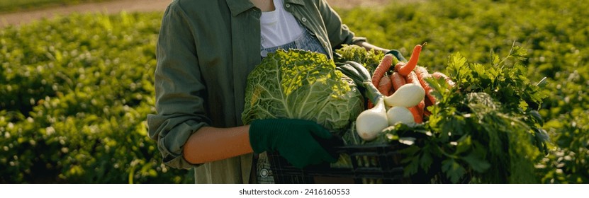 Smiling woman farmer with just harvested vegetables basket ready to sale. Agricultural concept - Powered by Shutterstock