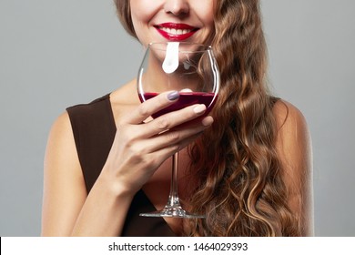 Smiling Woman With Glass Of Wine.Beautiful Middle Aged Woman Drinking Red Wine