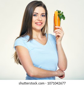 Smiling Woman Holding Carrot Stick In Glass. Smile With Teeth.