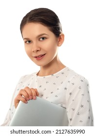 Smiling Woman Holding Closed Laptop Computer