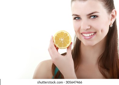 Smiling woman with lemon