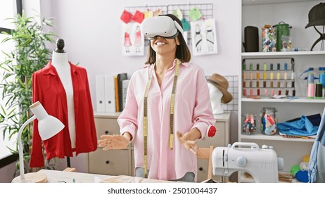 Smiling woman with measuring tape wearing vr headset in a colorful fashion design studio - Powered by Shutterstock