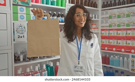 Smiling woman pharmacist holding paper bag stands in modern pharmacy full of medical products and hygiene items. - Powered by Shutterstock