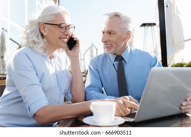 Smiling Woman Pointing On The Laptop