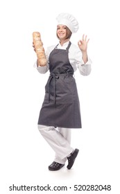 Smiling Woman Professional Chef, Cook Or Baker With Italian Bread Ciabatta Showing An Okay Sign Isolated On White Background. Restaurant, Dieting And Cooking Food Concept. Advertisement Gesture