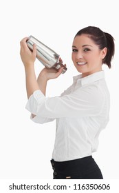 Smiling Woman Shaking Cocktail In Cocktail Shaker