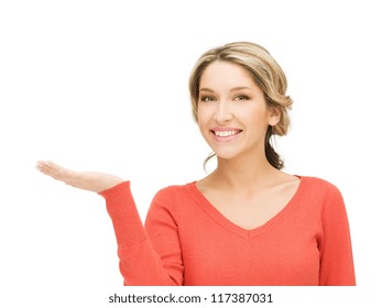 Smiling Woman Showing Something On The Palm Of Her Hand