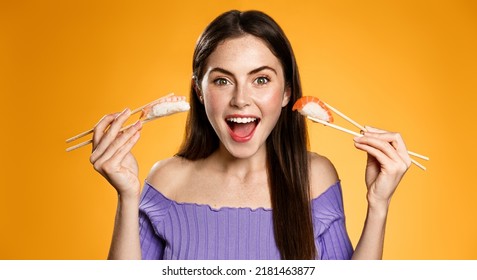 Smiling Woman Showing Sushi, Holding Nigiri With Chopsticks, Looking Excited, Advertisement Of Asian Food Restaurant Or Food Takeout, Orange Background