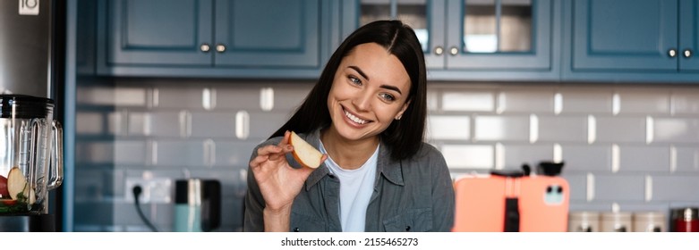 Smiling Woman Taking Selfie Footage With Apple On Cellphone At Home Kitchen