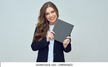 Smiling Woman Teacher Holding Book. Isolated Studio Portrait.