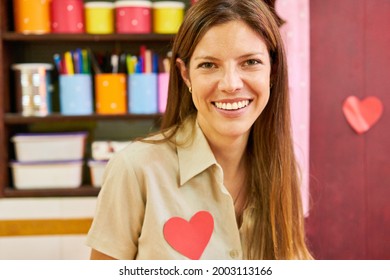 Smiling Woman As A Teacher In Preschool Or Kindergarten