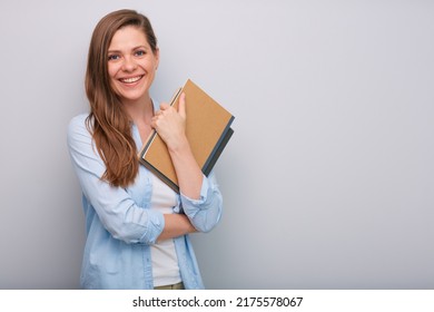 Smiling Woman Teacher Or Student Holding Book Or Workbook Isolated Portrait  