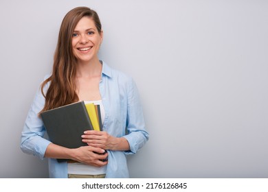 Smiling Woman Teacher Or Student Holding Book Or Workbook Isolated Portrait  