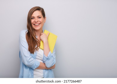 Smiling Woman Teacher Or Student Holding Book Or Workbook Isolated Portrait  