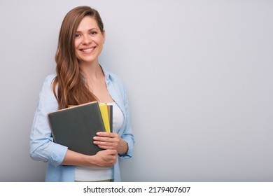 Smiling Woman Teacher Or Student Holding Book Or Workbook Isolated Portrait  