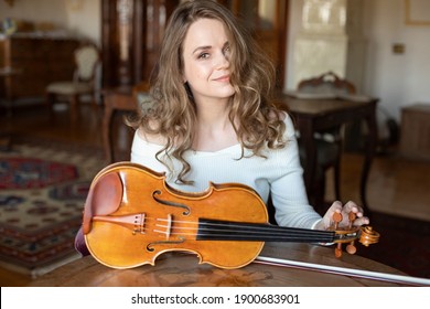 Smiling Woman With Violin . Music Teacher Online. Violin Teacher 
