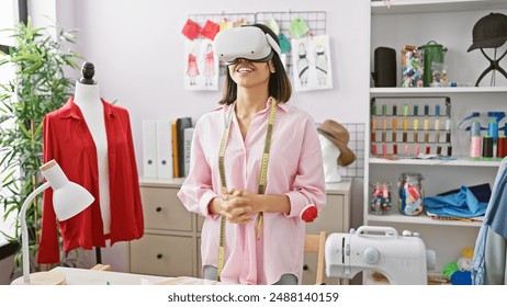 A smiling woman wearing a vr headset in a modern tailoring workshop with measuring tape around her neck. - Powered by Shutterstock