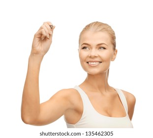 smiling woman in white shirt writing in the air - Powered by Shutterstock