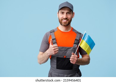 Smiling Worker Employee Man In Uniform Holding Ukrainian National Flag In Hand