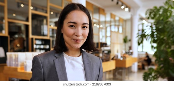 Smiling Young Adult Elegant Professional Leader Asian Business Woman, Korean Female Executive Manager Businesswoman Wearing Suit Standing Looking At Camera, Portrait, Banner.