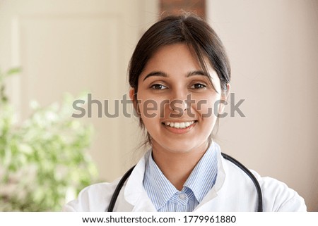 Similar – Image, Stock Photo Pretty female doctor in a geriatric clinic with elderly woman in wheelchair