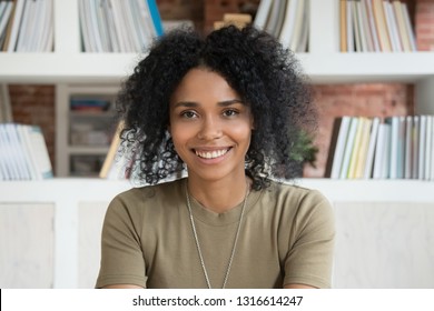 Smiling Young African American Female Student Or Online Teacher Tutor Looking At Camera Webcam Making Distance Video Conference Call For Job Interview, Happy Black Woman Record Vlog, Close Up Portrait