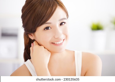 smiling young asian woman face