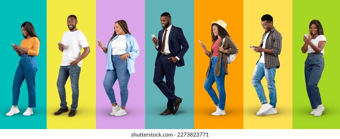 Smiling young black people in casual and suit typing on smartphones, internet surfing isolated on colorful background, studio, panorama. Communication and chat, social media technology, blog and app - Powered by Shutterstock