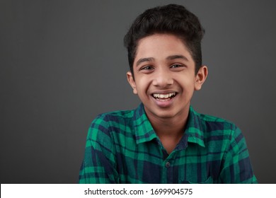 Smiling young boy of Indian ethnicity 
