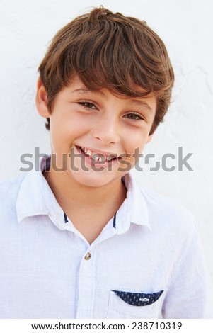 Similar – Image, Stock Photo Brown-haired boy with an athletic physique on an athletic oval massages his muscles with a foam roller for better recovery. Post-workout