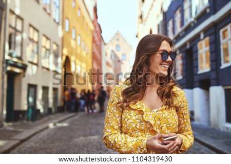 Similar – Foto Bild Person, die durch die gepflasterte Tunnelstraße geht.