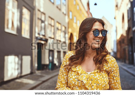 Similar – Foto Bild Person, die durch die gepflasterte Tunnelstraße geht.