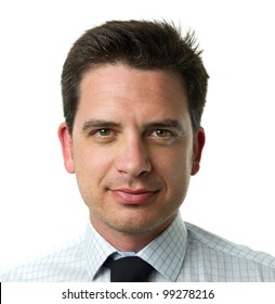 Smiling Young Business Man. Close Up Portrait Over Monochrome White Background