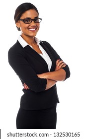 Smiling Young Business Professional Posing With Arms Crossed.