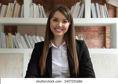 Smiling Young Business Woman In Suit Coach Teacher Looking At Camera At Distant Job Interview, Confident Female Professional Looking At Webcam Talking Make Conference Call Doing Internet Video Chat