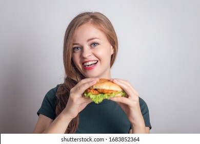 Smiling Young Caucasian Woman Girl Holding Eating Chicken Burger