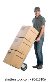Smiling young delivery man moving boxes with dolly, isolated on white background