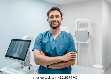 Smiling young doctor medical worker specialist radiologist standing in his cabinet office in modern clinic crossed folded arms looking at camera. Fluorography roentgenography x-ray concept - Powered by Shutterstock