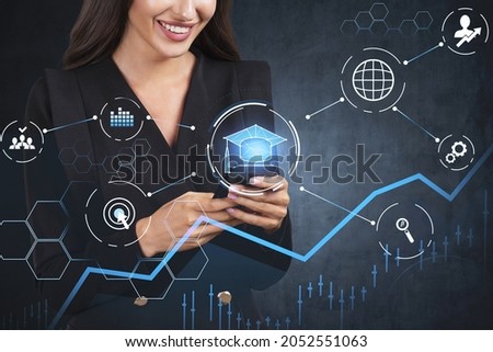 Smiling young educational consultant researching master degree programs in business administration, postgraduate level. Research of the best ranking university in the world. Hologram icons
