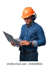 Smiling Young Engineer Holding A Notebook, Wearing A Helmet And Earmuff. On A White Background With Clipping Path And Cut Out