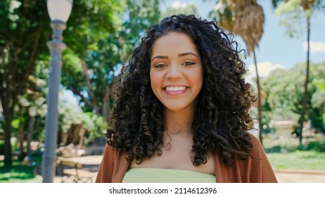 Smiling young latin woman. Joy, positive and love. Beautiful Brazilian girl.