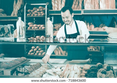 Similar – Image, Stock Photo African man works in pastry shop.