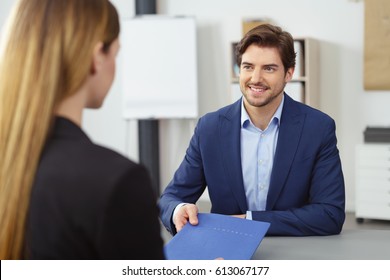 Smiling Young Man Attending Job Interview Stock Photo 613067177 Smiling Young Man Attending Job Interview Stock Photo 613067177