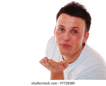 Smiling Young Man Blows A Kiss