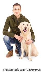 Smiling Young Man Posing With A Retriever Dog Isolated On White Background